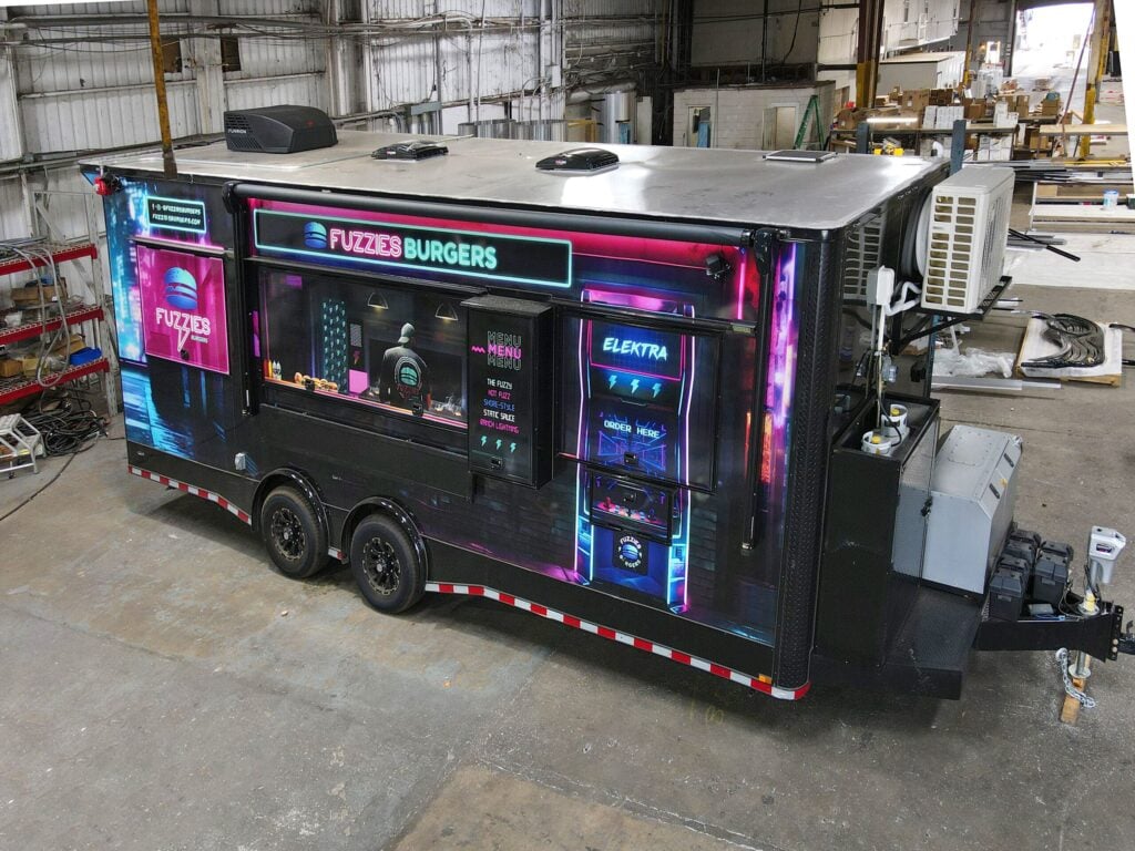 Fully equipped SDG concession trailer with a full wrap, serving window and onboard generator in the Waycross, Georgia shop